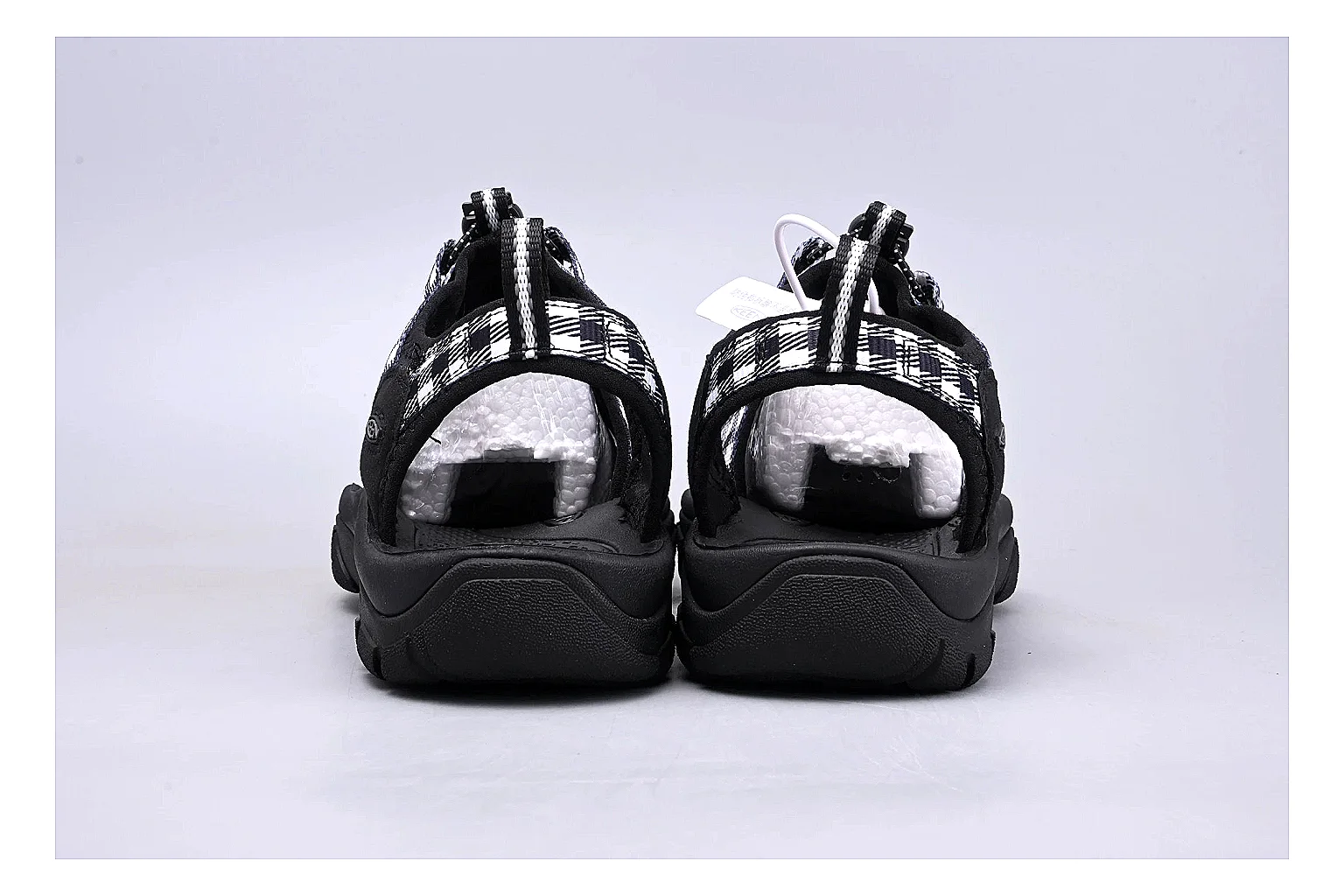 KEEN Zerraport Plaid Sandal comparison signal photo with white black plaid zerraport outdoor sandal with mixed upper and sandal shape thumbnail 3