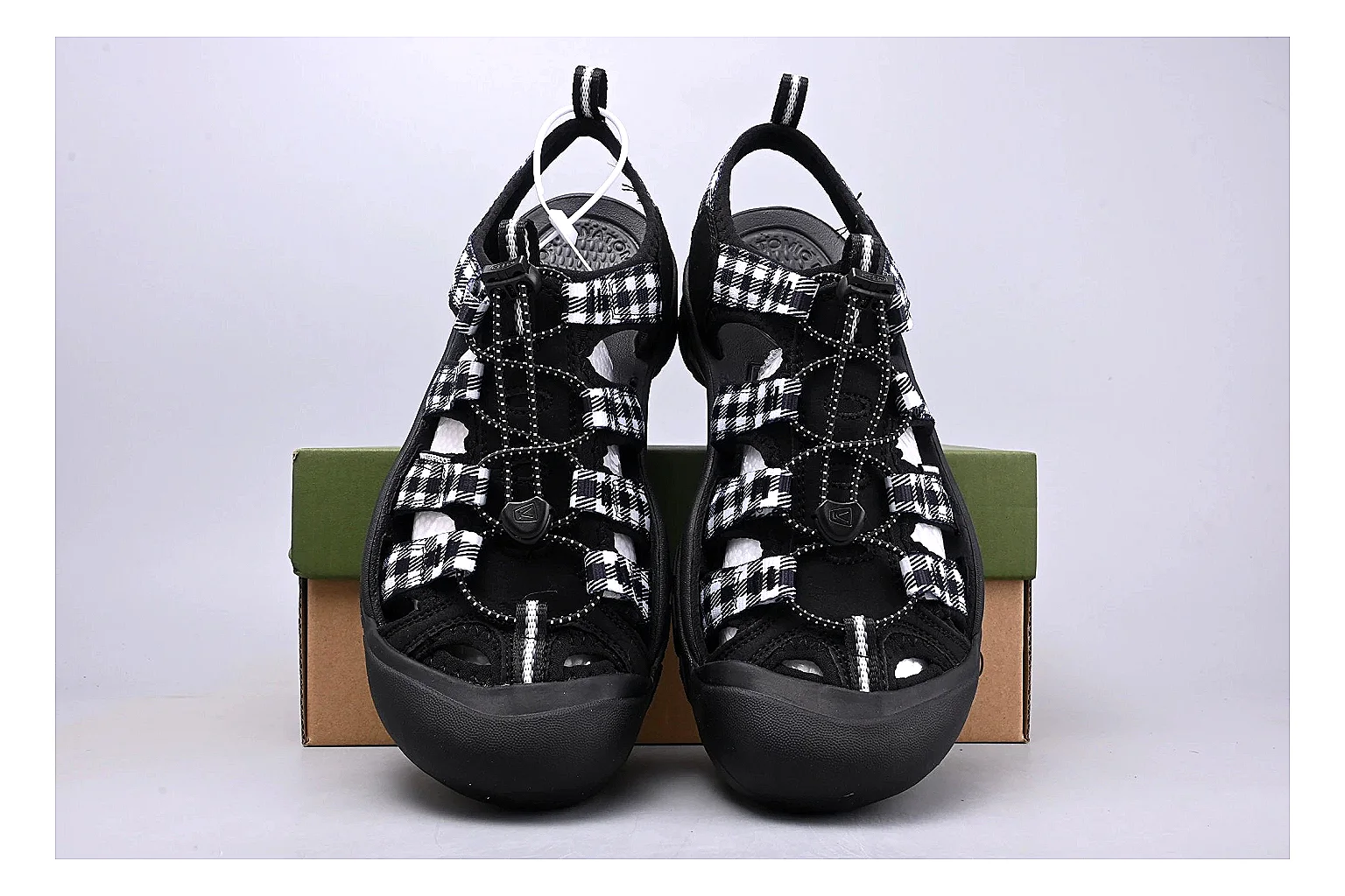 KEEN Zerraport Plaid Sandal comparison signal photo with white black plaid zerraport outdoor sandal with mixed upper and sandal shape thumbnail 4