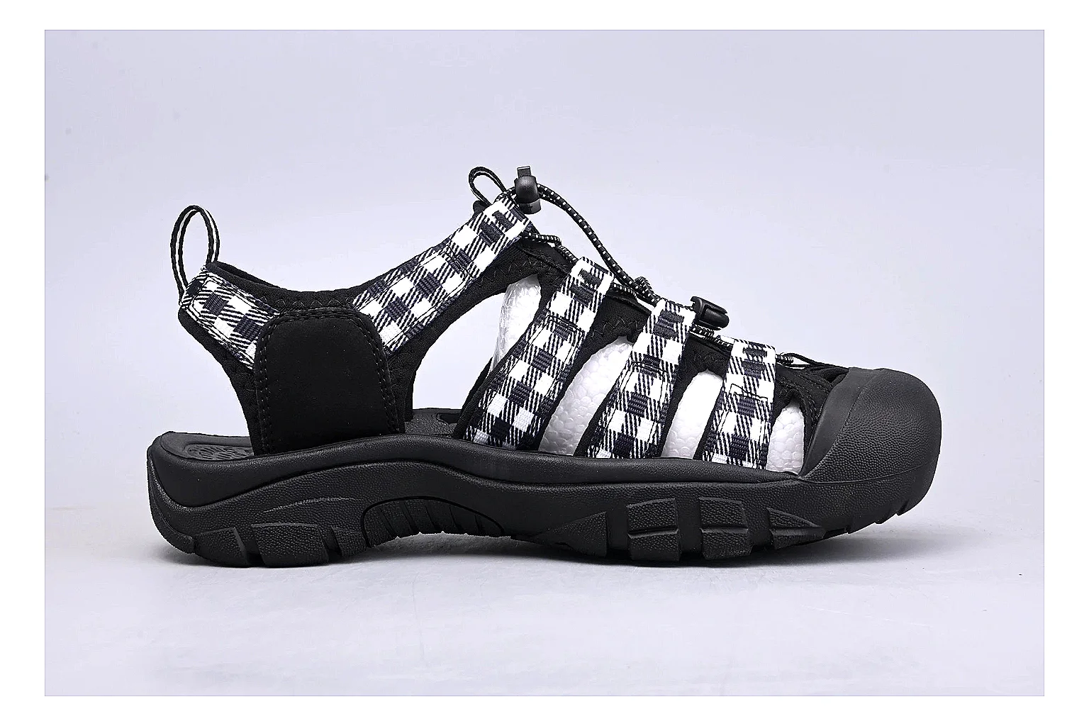 KEEN Zerraport Plaid Sandal comparison signal photo with white black plaid zerraport outdoor sandal with mixed upper and sandal shape thumbnail 6