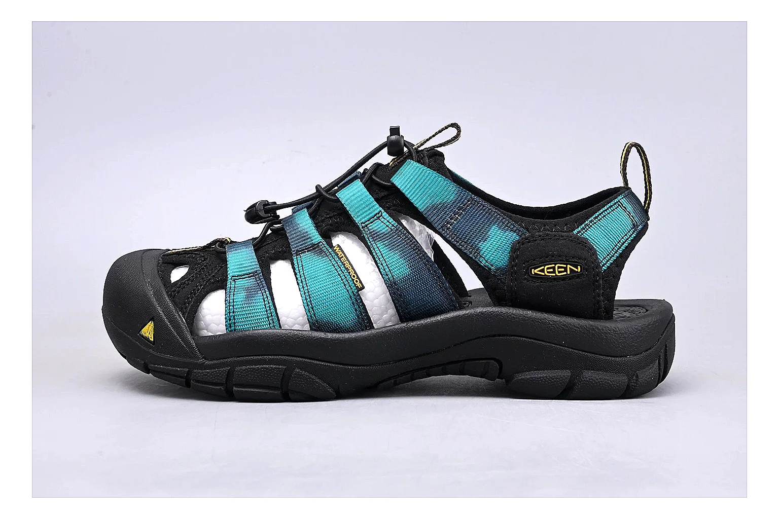 KEEN Zerraport Black Teal Sandal comparison signal photo with black teal zerraport outdoor sandal with mixed upper and sandal shape