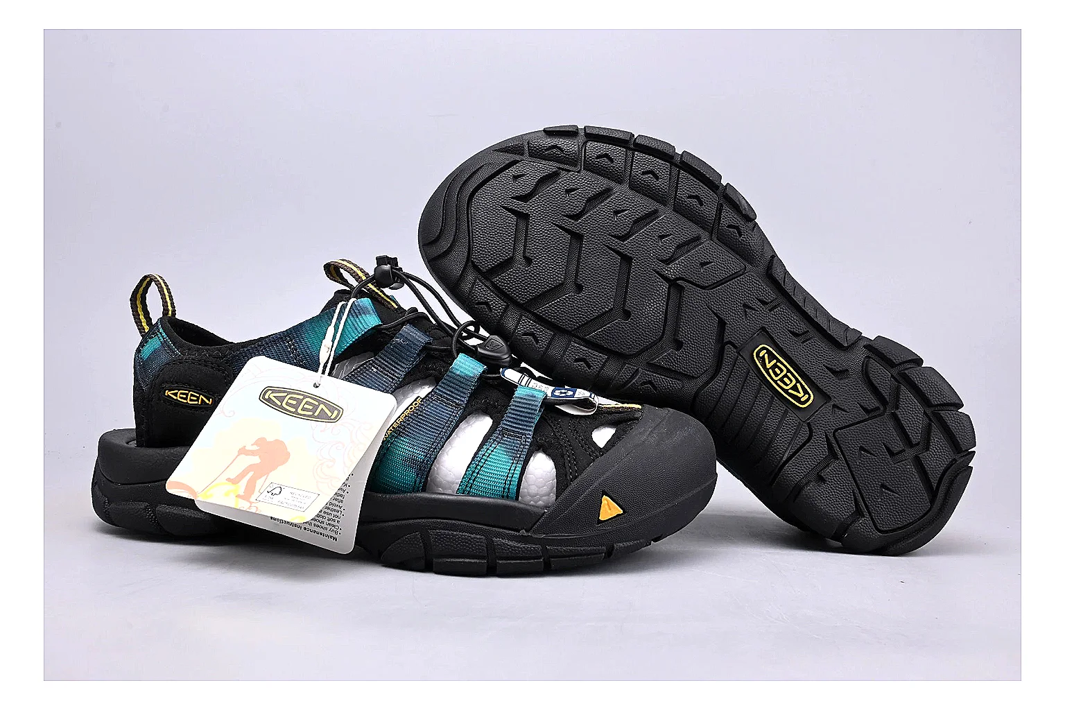 KEEN Zerraport Black Teal Sandal comparison signal photo with black teal zerraport outdoor sandal with mixed upper and sandal shape thumbnail 5