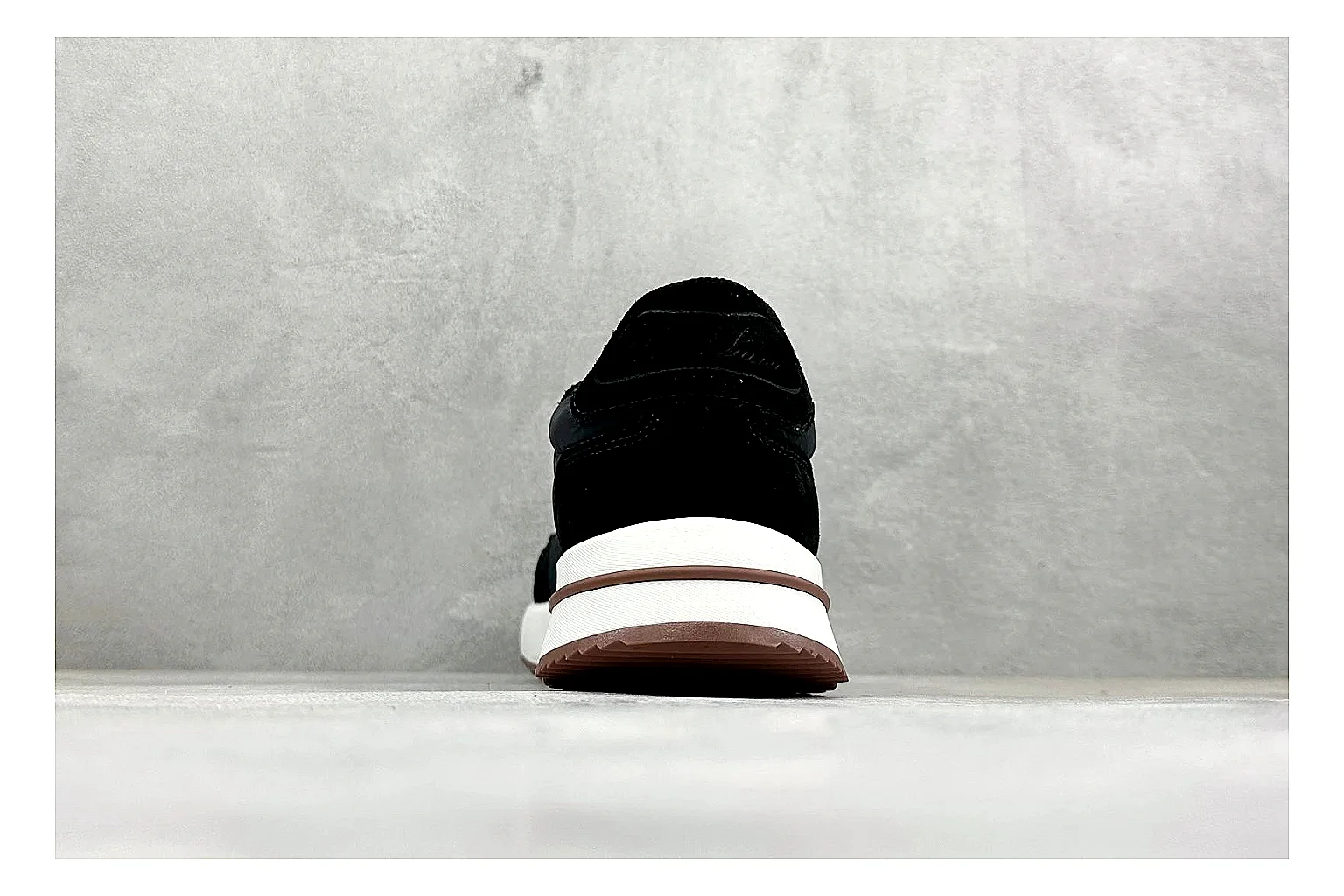 Loro Piana Week-End Black comparison image with black suede upper, low casual profile, striped midsole accent, and soft everyday shape thumbnail 3