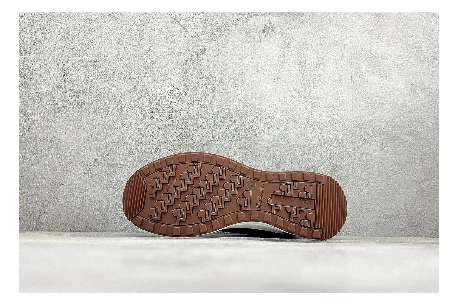Loro Piana Week-End Black comparison image with black suede upper, low casual profile, striped midsole accent, and soft everyday shape thumbnail 4