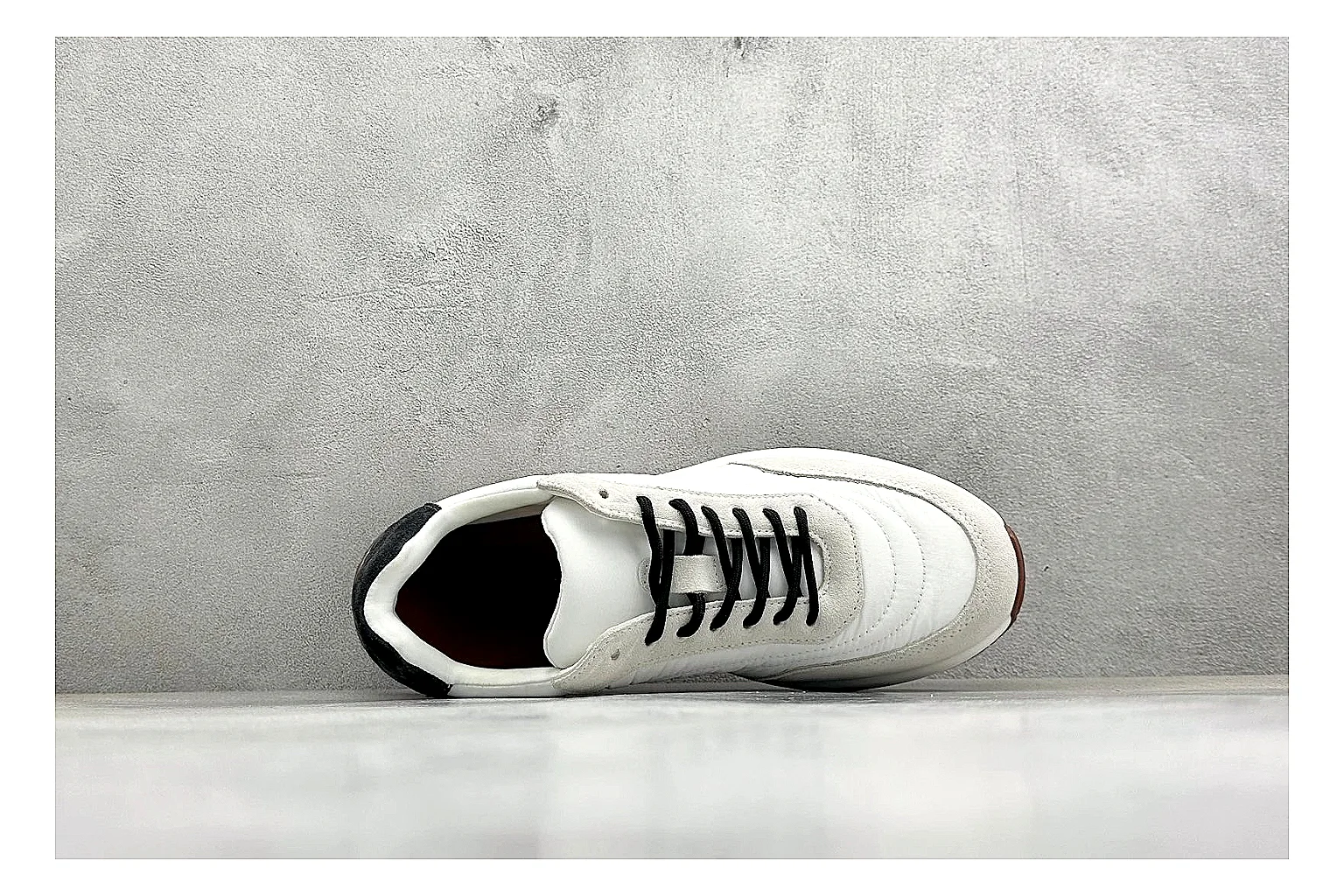 Loro Piana Week-End White comparison image with white leather upper, gum outsole, low clean profile, and restrained casual detailing