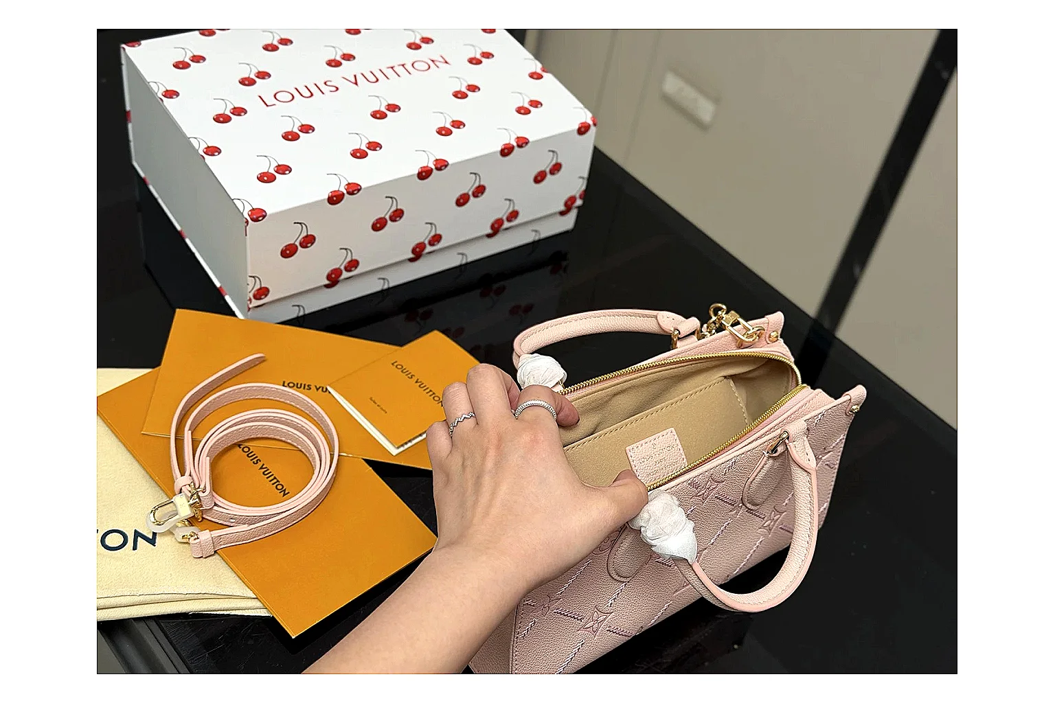 Louis Vuitton Mini Top Handle Pink comparison photo showing pink leather mini bag body, structured top handle, compact luxury shape, and clean hardware details thumbnail 4