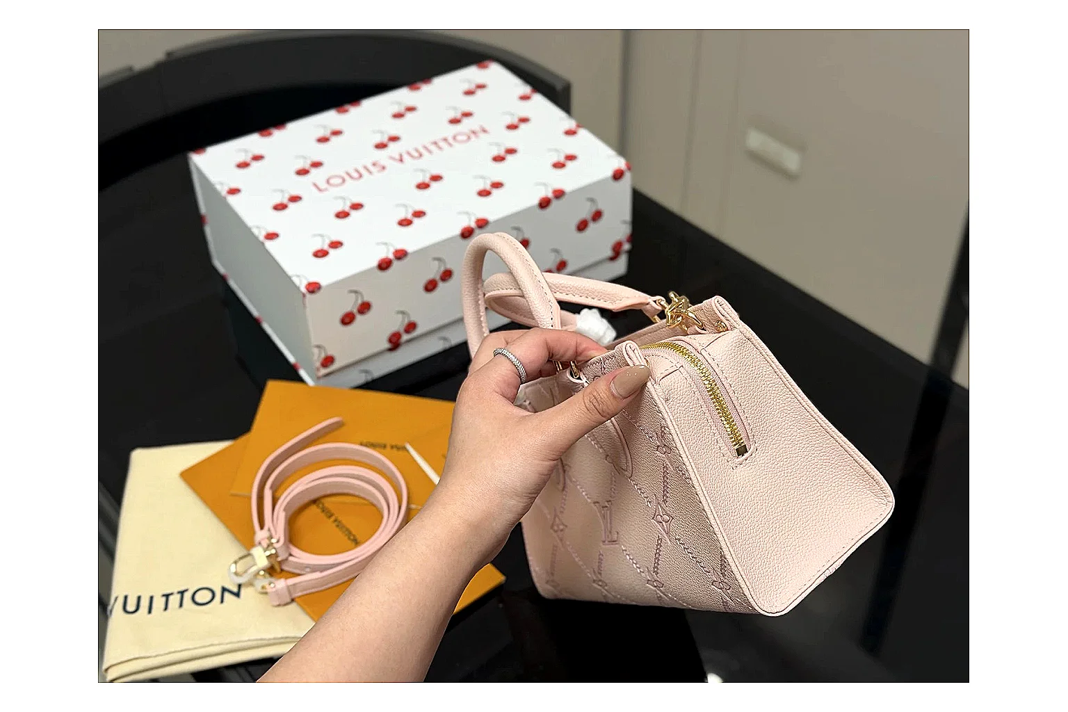 Louis Vuitton Mini Top Handle Pink comparison photo showing pink leather mini bag body, structured top handle, compact luxury shape, and clean hardware details thumbnail 5