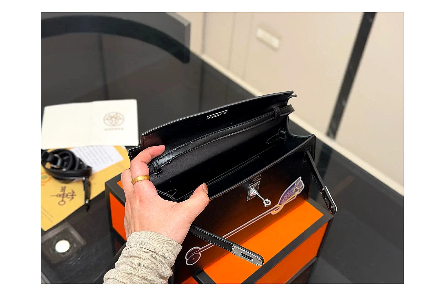 Louis Vuitton Wallet On Chain Black comparison photo showing black leather wallet-bag body, compact flap shape, chain strap, and polished LV-style hardware thumbnail 4