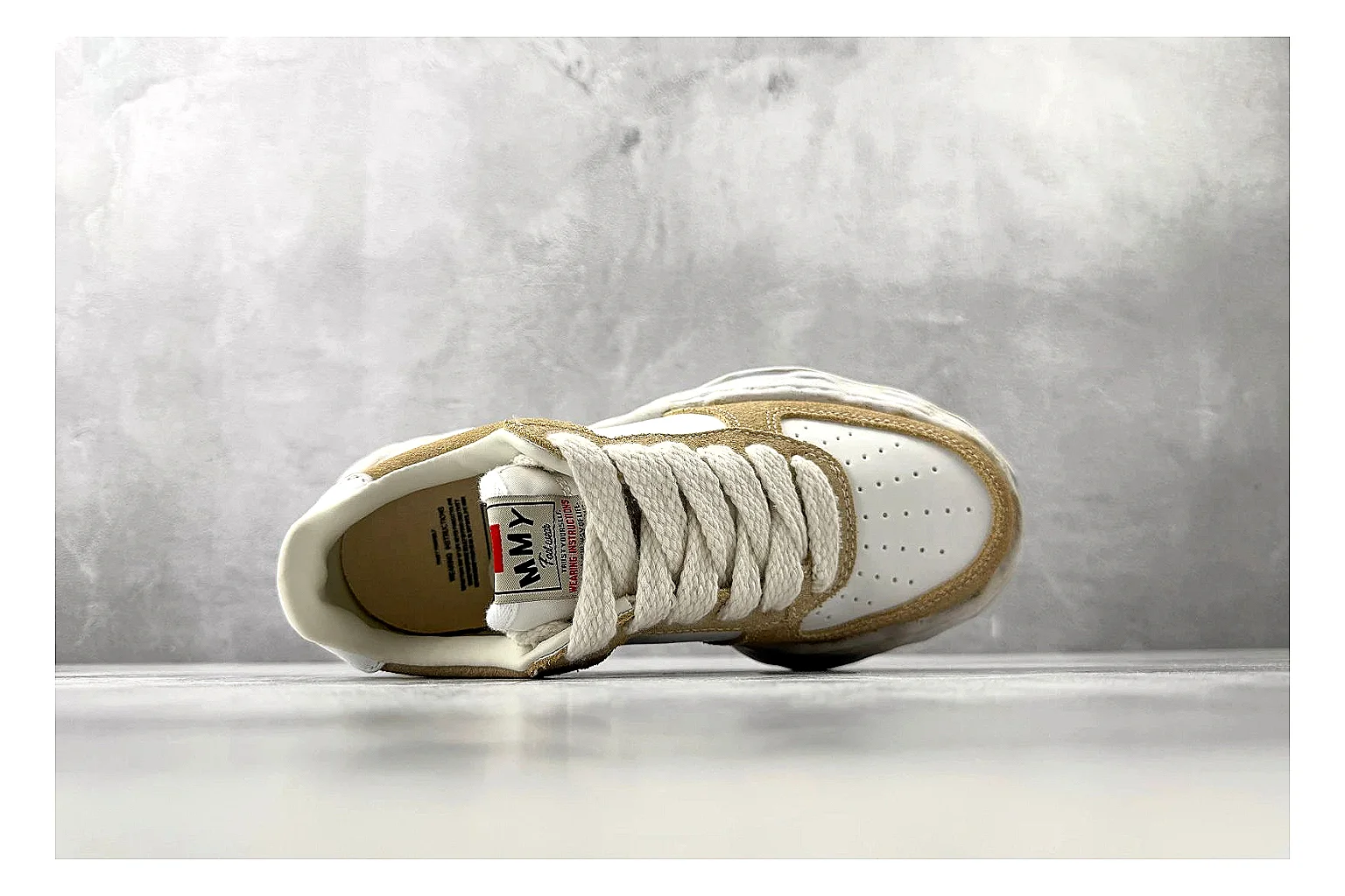 Maison Mihara Yasuhiro Blakey Beige Distressed comparison photo showing beige distressed canvas upper, warped sculpted white sole, low lace profile, and intentionally worn texture