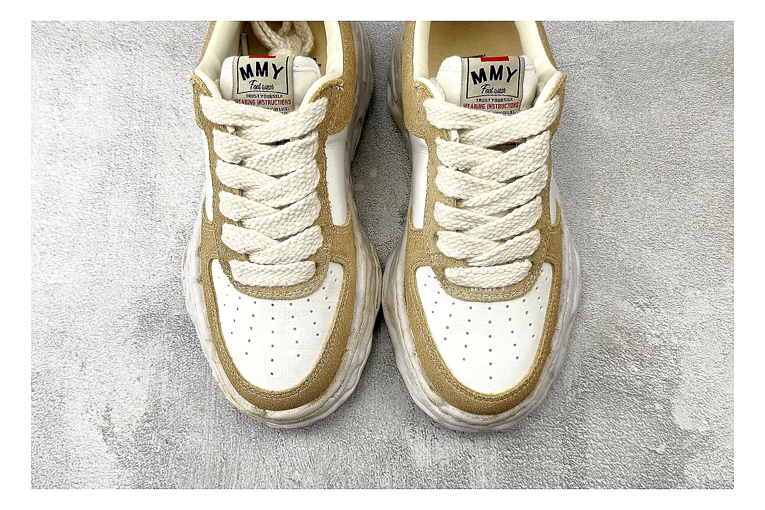 Maison Mihara Yasuhiro Blakey Beige Distressed comparison photo showing beige distressed canvas upper, warped sculpted white sole, low lace profile, and intentionally worn texture thumbnail 5