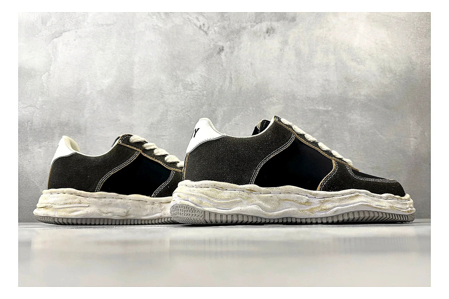 Maison Mihara Yasuhiro Blakey Black Distressed comparison photo showing black distressed canvas upper, warped sculpted white sole, low lace profile, and worn texture thumbnail 3