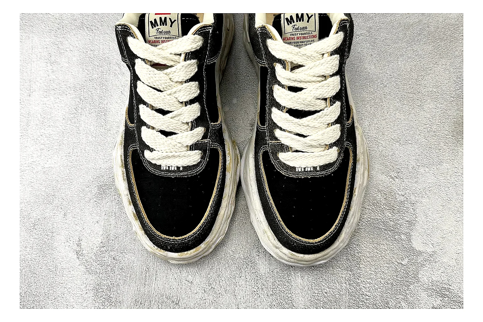 Maison Mihara Yasuhiro Blakey Black Distressed comparison photo showing black distressed canvas upper, warped sculpted white sole, low lace profile, and worn texture thumbnail 5