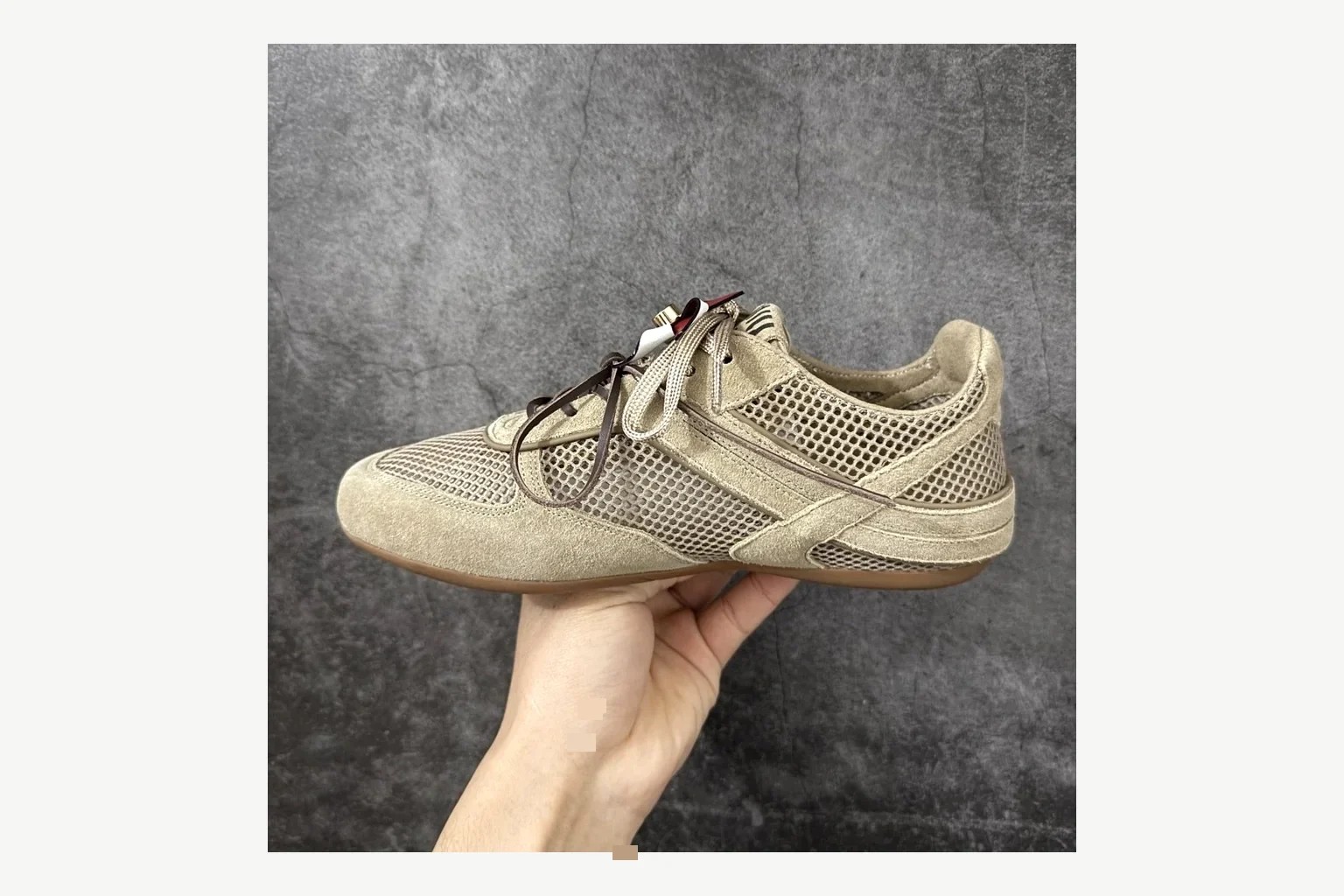 Miu Miu Beige Logo Sneaker comparison signal photo with beige logo low-top with mixed-material upper and low-profile shape