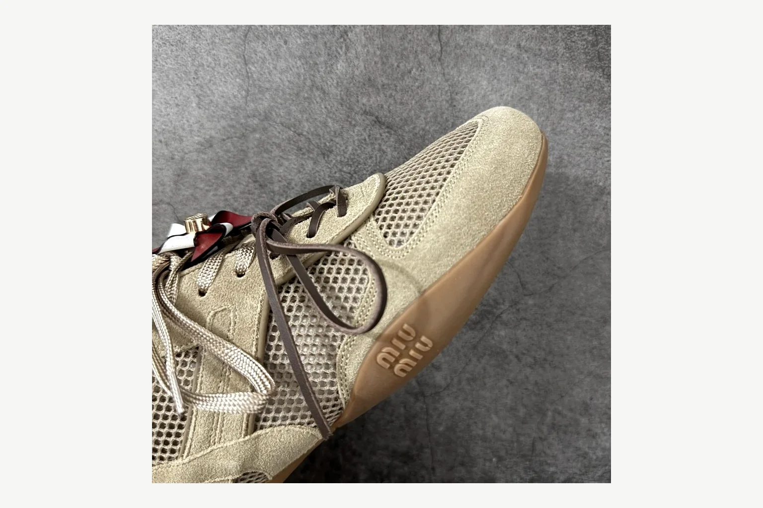 Miu Miu Beige Logo Sneaker comparison signal photo with beige logo low-top with mixed-material upper and low-profile shape thumbnail 5