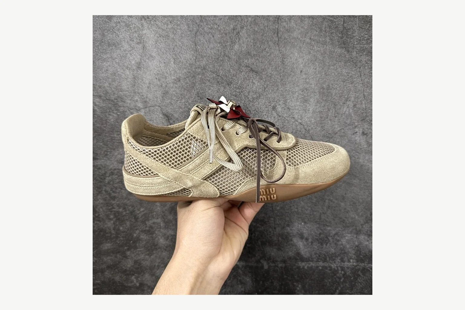 Miu Miu Beige Logo Sneaker comparison signal photo with beige logo low-top with mixed-material upper and low-profile shape thumbnail 6