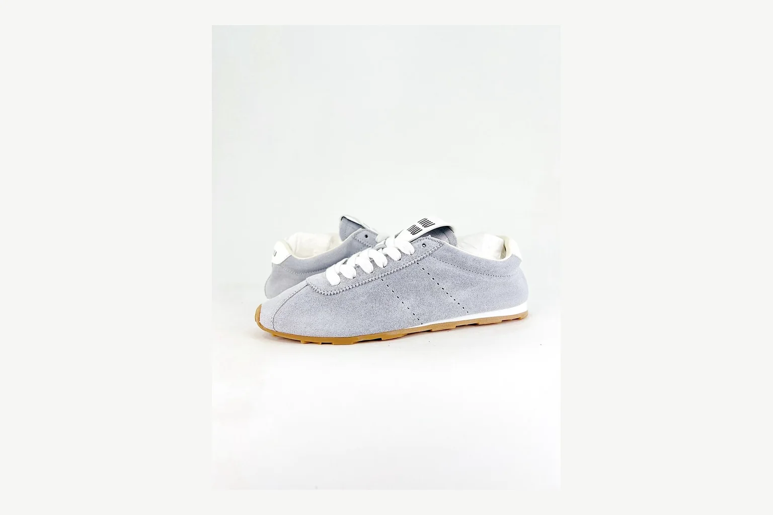 Miu Miu Grey Low Sneaker comparison signal photo with grey fashion low-top with mixed-material upper and low-profile shape