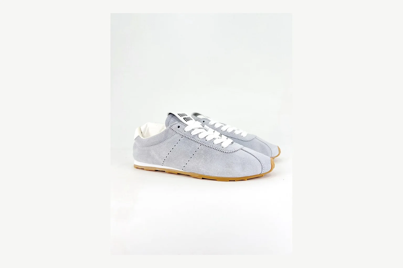 Miu Miu Grey Low Sneaker comparison signal photo with grey fashion low-top with mixed-material upper and low-profile shape