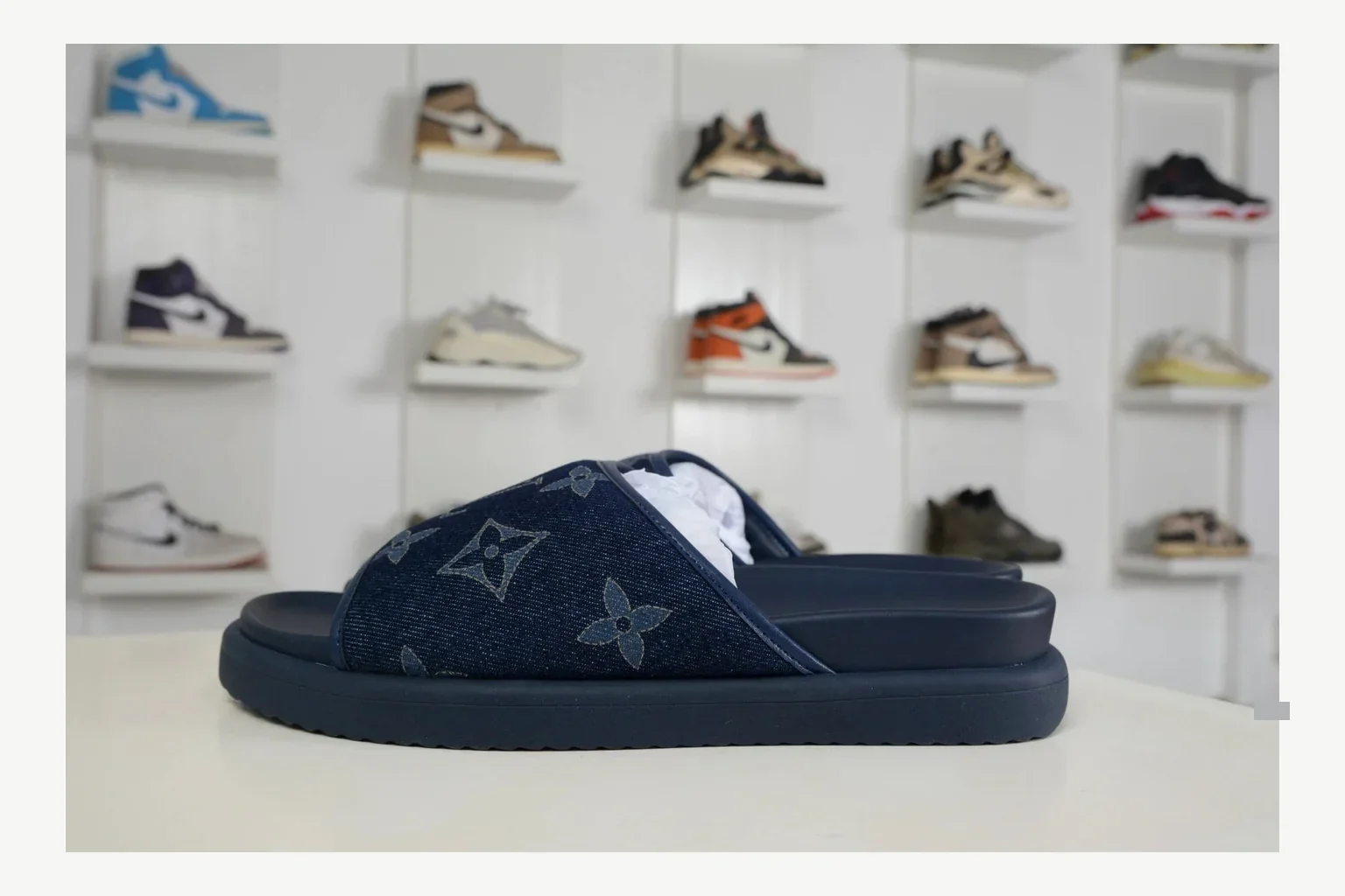 Miu Miu Navy Denim Slide comparison signal photo with navy denim denim slide with denim upper and low-profile shape