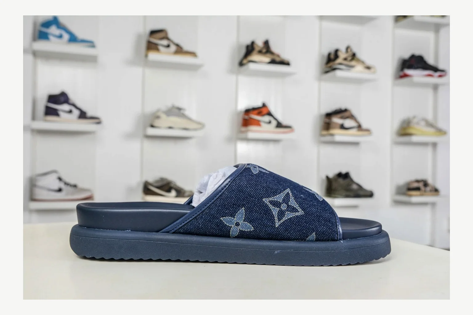 Miu Miu Navy Denim Slide comparison signal photo with navy denim denim slide with denim upper and low-profile shape