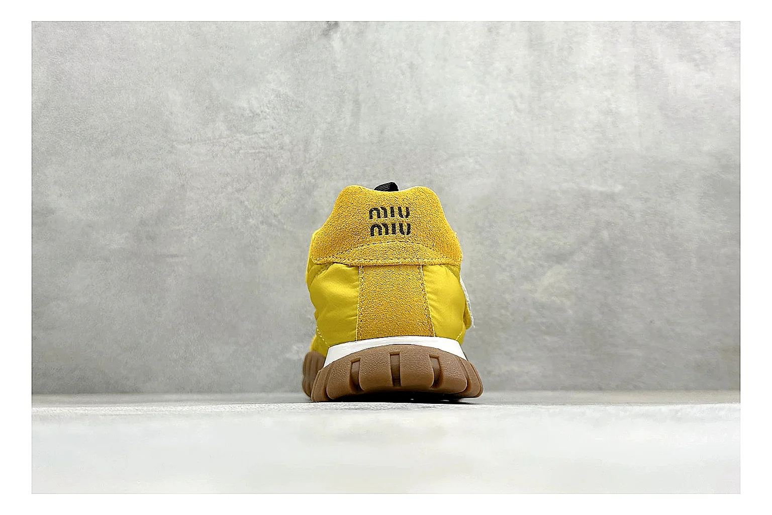 Miu Miu Tyre Yellow Mary Jane comparison photo showing yellow Mary Jane upper, strap closure, rugged Tyre outsole, and playful low-profile shape thumbnail 3