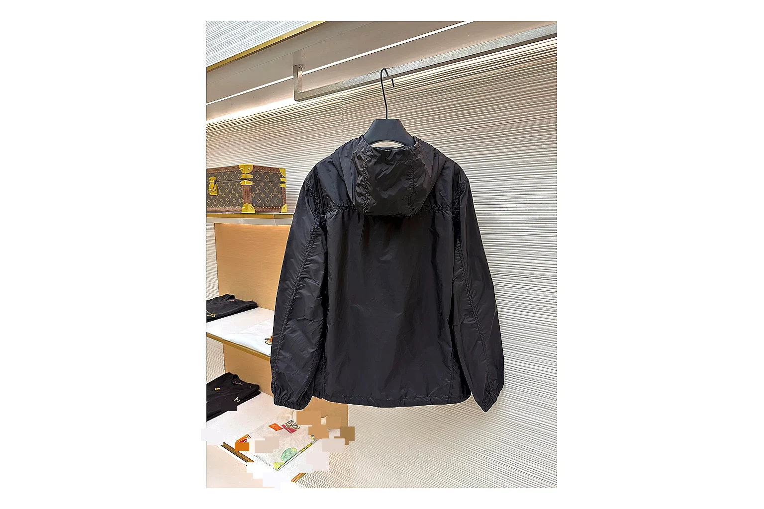 Moncler Nylon Hooded Jacket Black Jacket comparison signal photo with black nylon hooded jacket with nylon texture, hood structure, zipper line, sleeve cuffs, and light shell shape