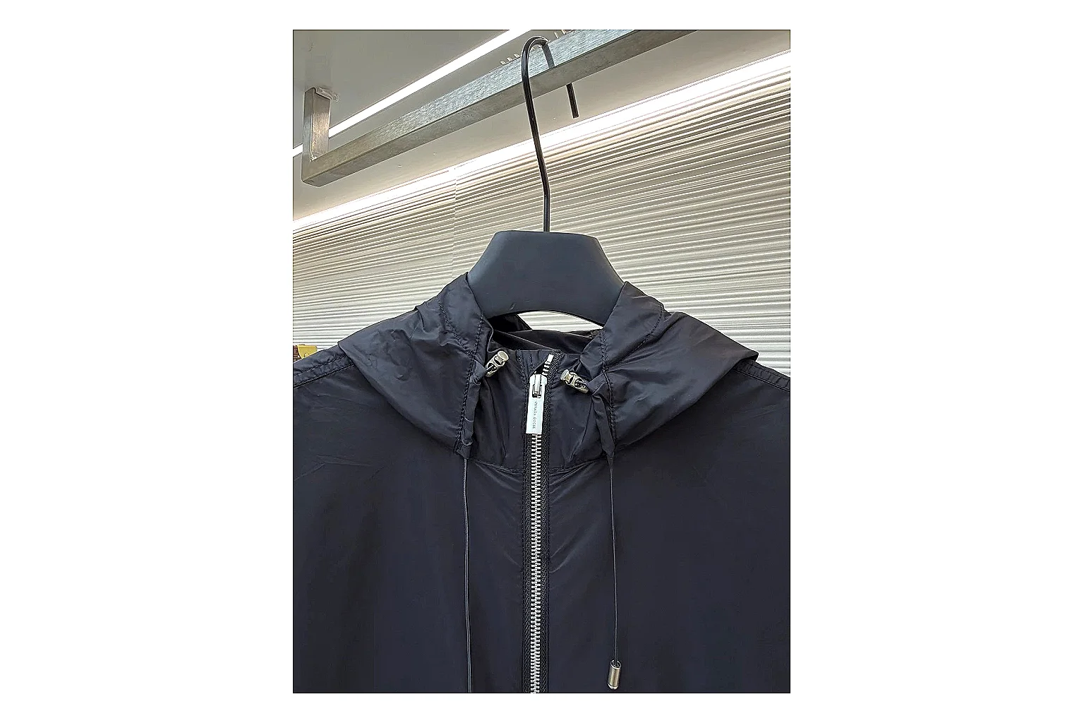 Moncler Nylon Hooded Jacket Black Jacket comparison signal photo with black nylon hooded jacket with nylon texture, hood structure, zipper line, sleeve cuffs, and light shell shape thumbnail 6