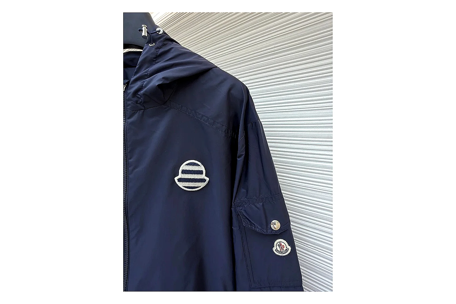 Moncler Nylon Hooded Jacket Navy Jacket comparison signal photo with navy nylon hooded jacket with nylon texture, hood structure, zipper line, sleeve cuffs, and light shell shape thumbnail 5