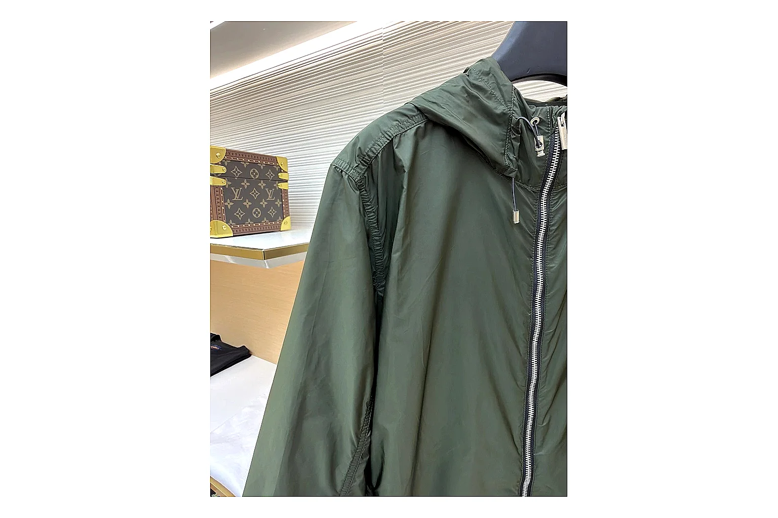 Moncler Nylon Hooded Jacket Olive Jacket comparison signal photo with olive nylon hooded jacket with nylon texture, hood structure, zipper line, sleeve cuffs, and light shell shape thumbnail 3