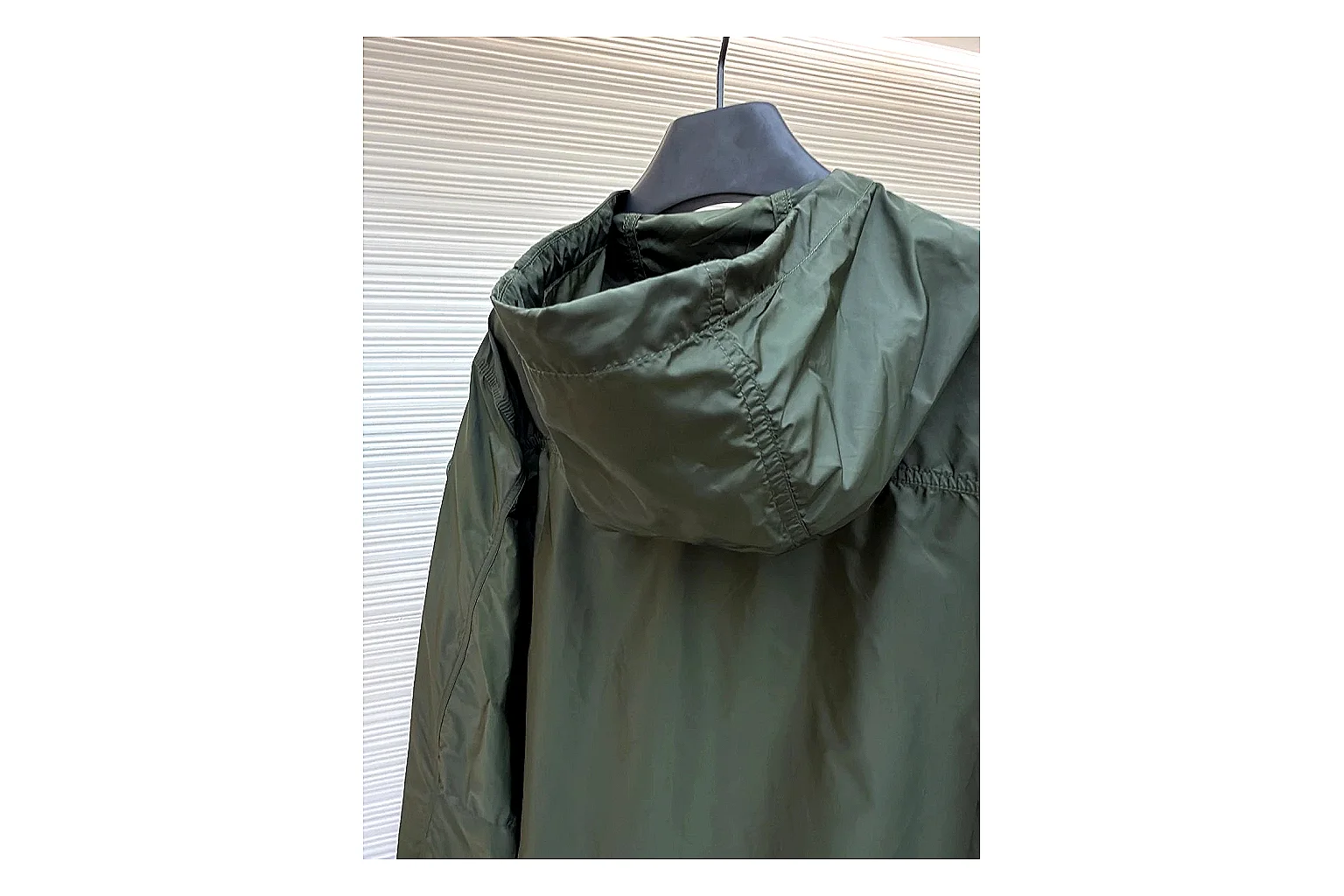 Moncler Nylon Hooded Jacket Olive Jacket comparison signal photo with olive nylon hooded jacket with nylon texture, hood structure, zipper line, sleeve cuffs, and light shell shape thumbnail 4