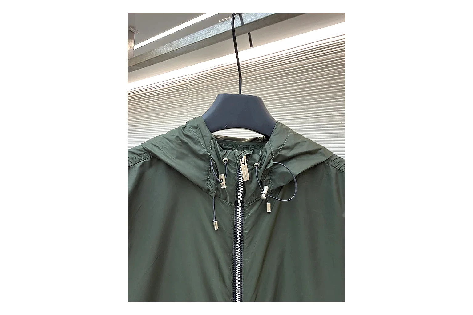 Moncler Nylon Hooded Jacket Olive Jacket comparison signal photo with olive nylon hooded jacket with nylon texture, hood structure, zipper line, sleeve cuffs, and light shell shape thumbnail 6