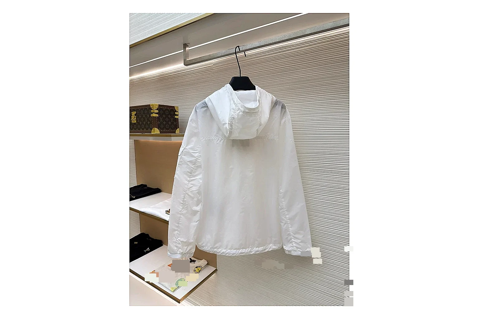 Moncler Nylon Hooded Jacket White Jacket comparison signal photo with white nylon hooded jacket with nylon texture, hood structure, zipper line, sleeve cuffs, and light shell shape