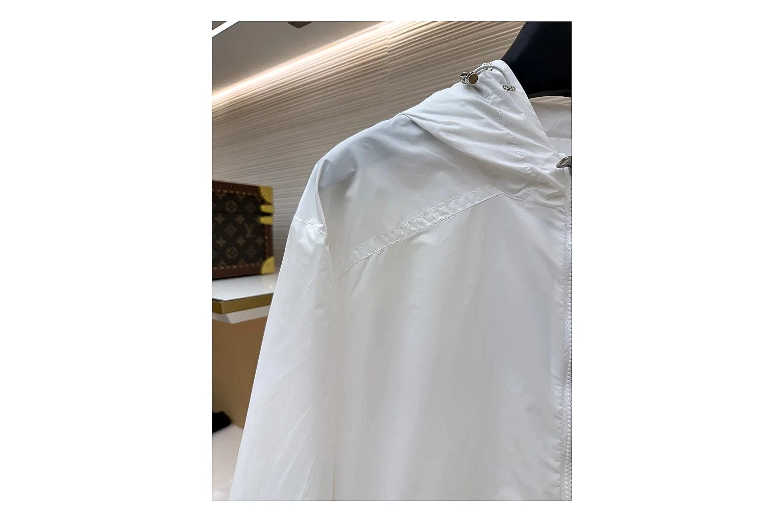 Moncler Nylon Hooded Jacket White Jacket comparison signal photo with white nylon hooded jacket with nylon texture, hood structure, zipper line, sleeve cuffs, and light shell shape thumbnail 3
