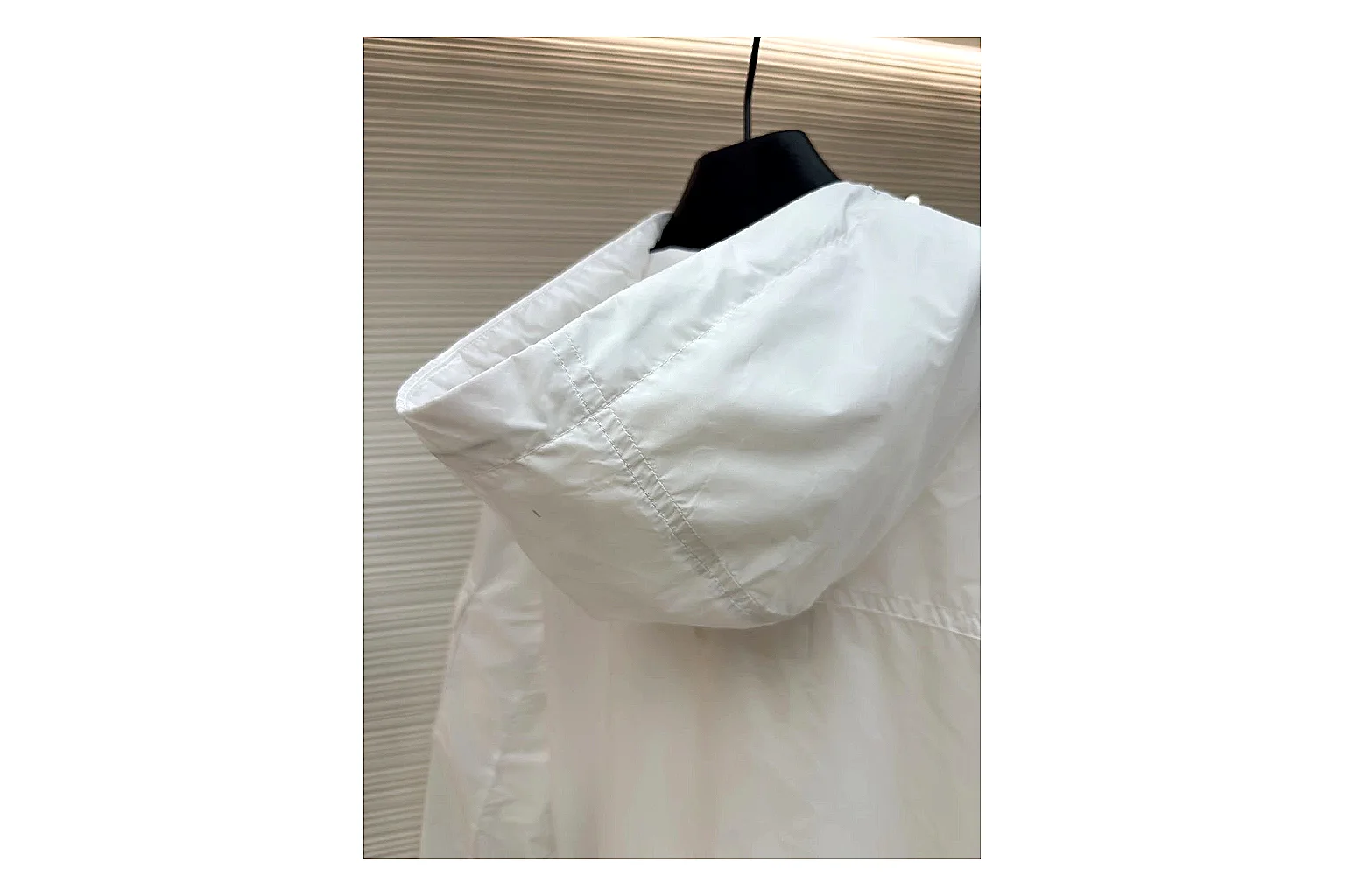 Moncler Nylon Hooded Jacket White Jacket comparison signal photo with white nylon hooded jacket with nylon texture, hood structure, zipper line, sleeve cuffs, and light shell shape thumbnail 4