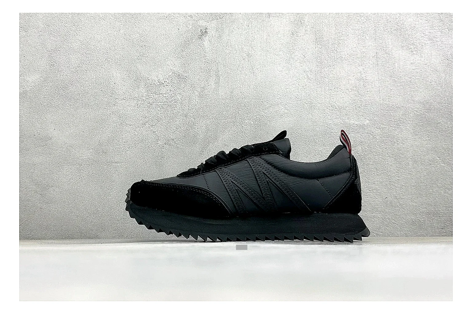 Moncler Pacey black suede comparison signal image