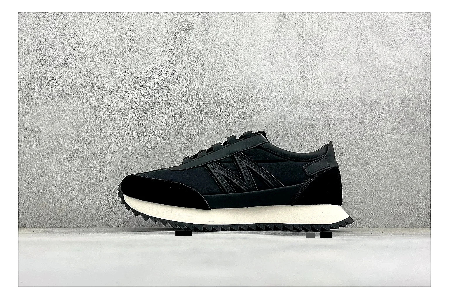 Moncler Pacey Black White comparison image with black upper, white rugged outsole, low padded collar, and outdoor-leaning tread profile