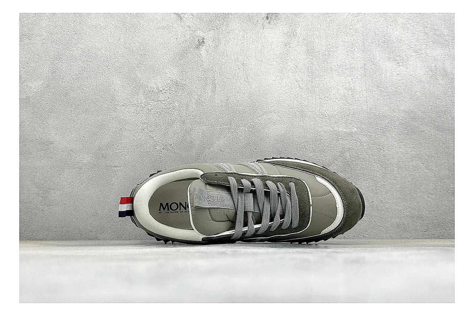 Moncler Pacey Grey Suede comparison image with grey suede upper, rugged white outsole, low collar, and soft neutral streetwear tone thumbnail 2