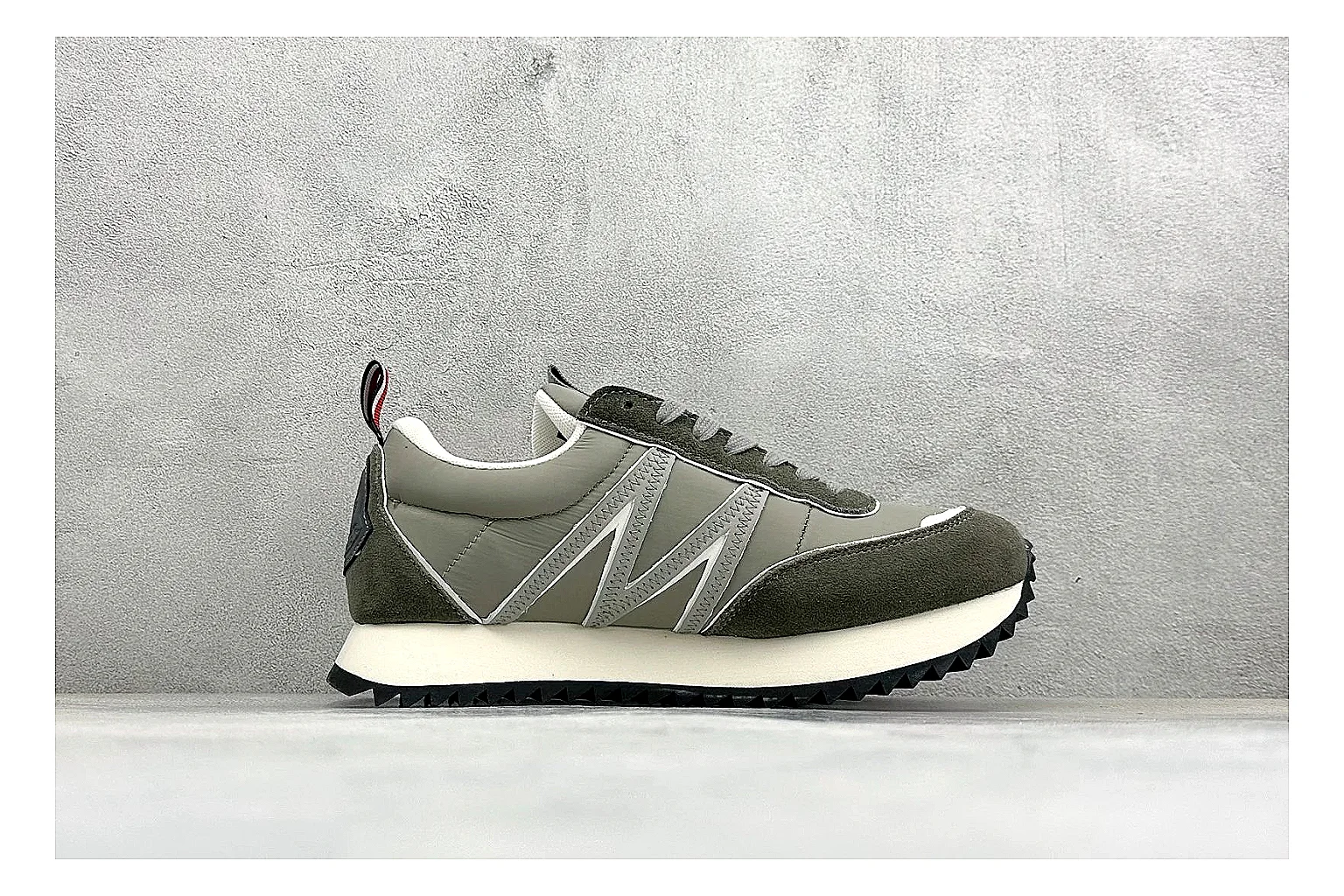 Moncler Pacey Grey Suede comparison image with grey suede upper, rugged white outsole, low collar, and soft neutral streetwear tone thumbnail 6