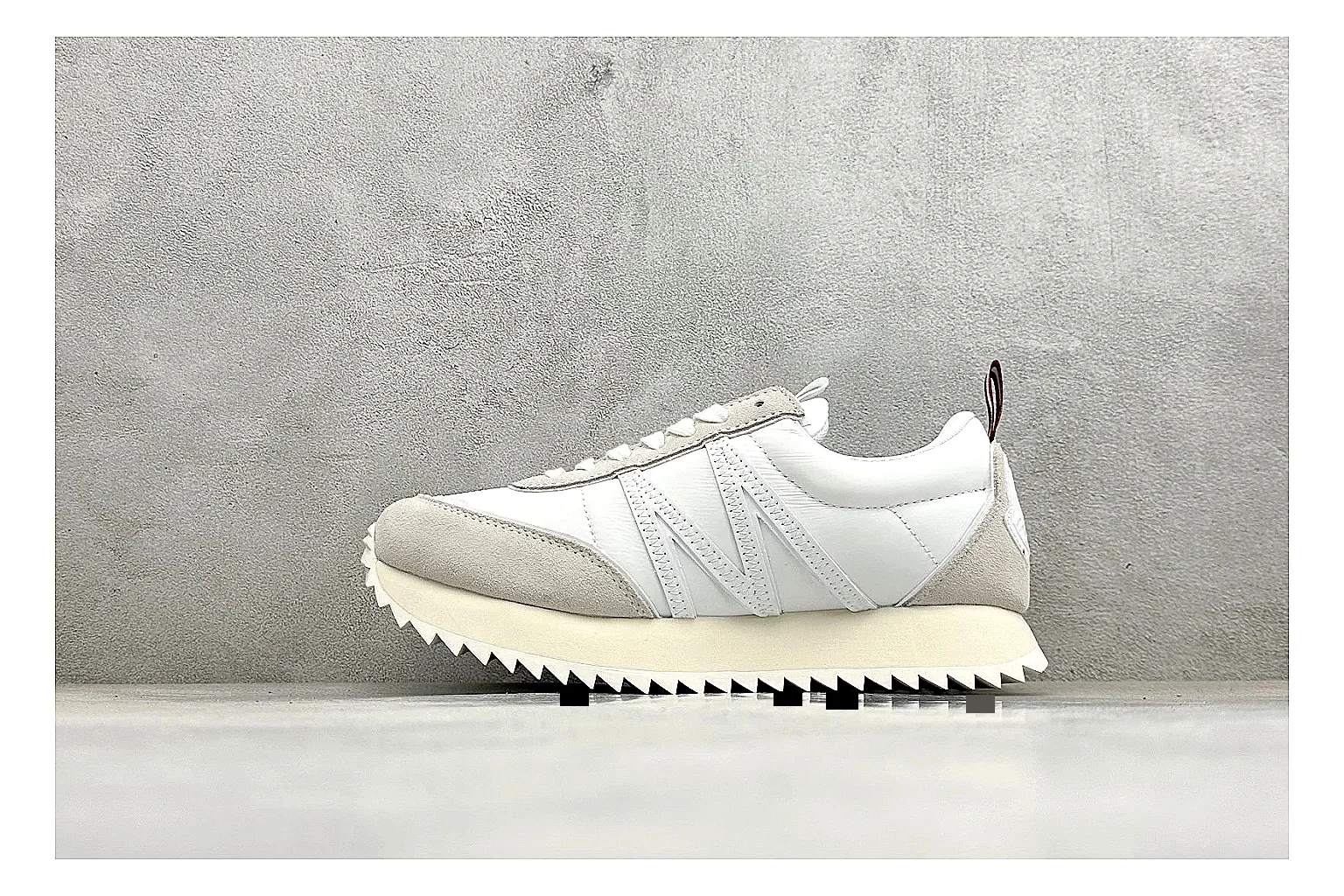 Moncler Pacey White Suede comparison image with light suede upper, chunky serrated outsole, low padded collar, and tonal casual build