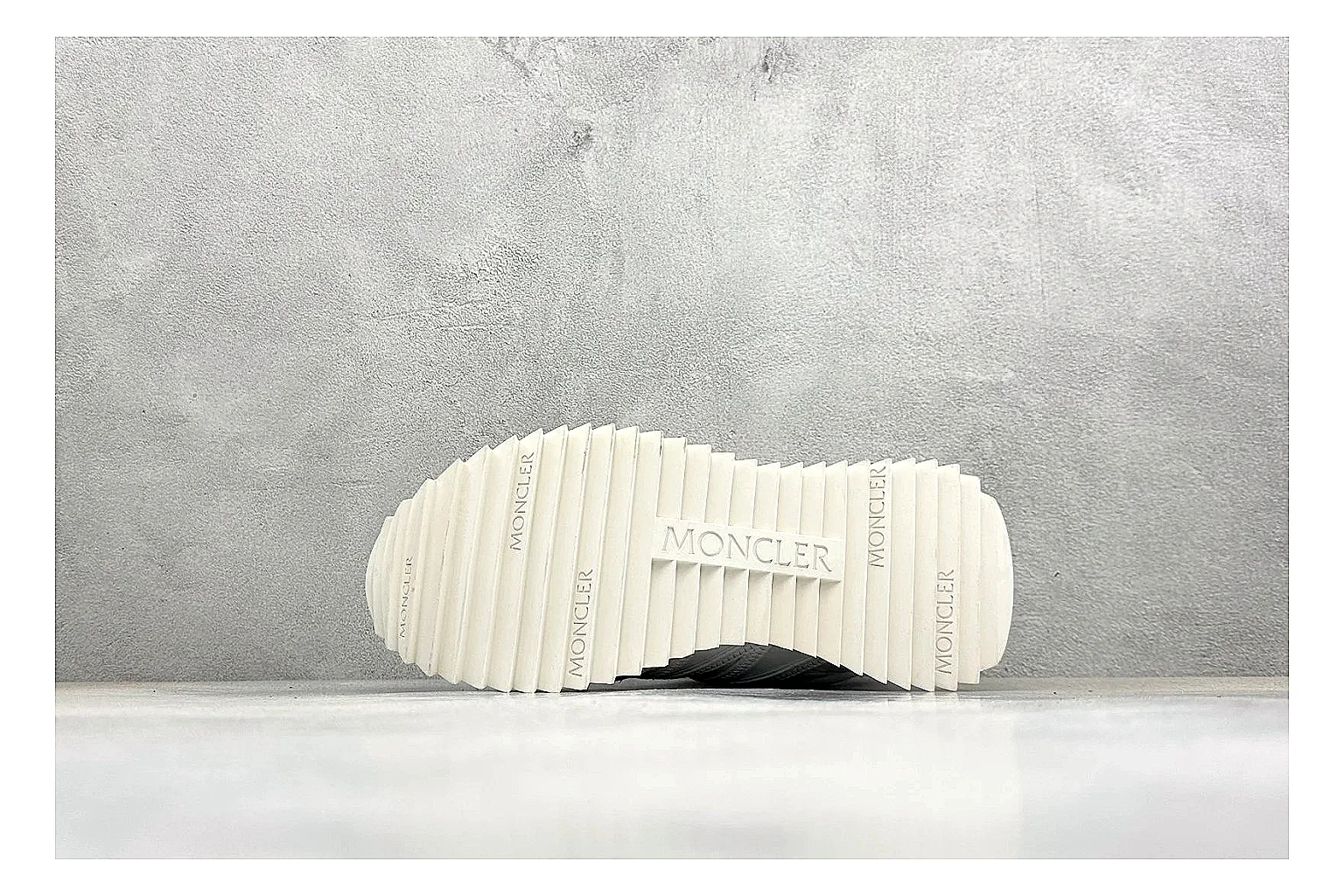 Moncler Pacey White Suede comparison image with light suede upper, chunky serrated outsole, low padded collar, and tonal casual build thumbnail 4