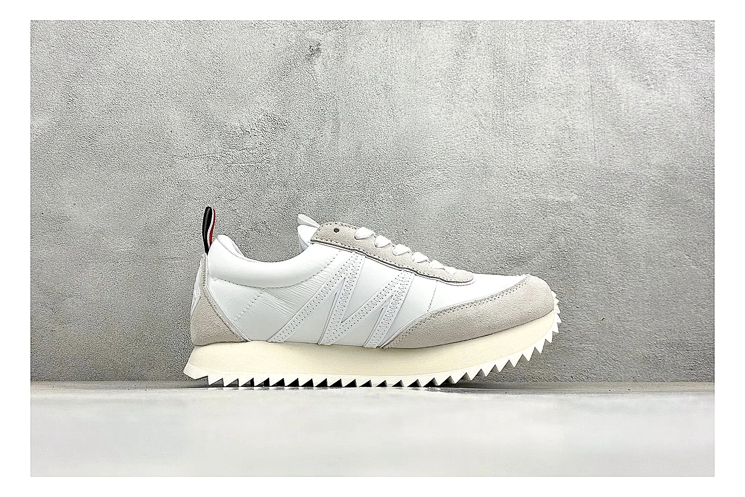 Moncler Pacey White Suede comparison image with light suede upper, chunky serrated outsole, low padded collar, and tonal casual build thumbnail 6