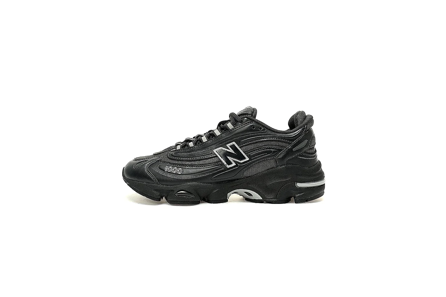 Black New Balance 1000 9807 side profile with mesh panels and silver accents thumbnail 2