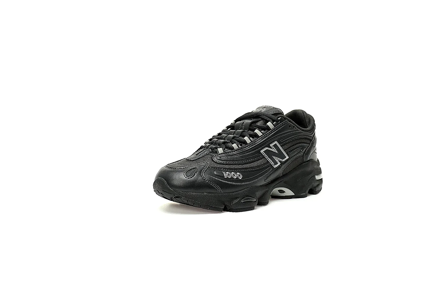 Black New Balance 1000 9807 side profile with mesh panels and silver accents thumbnail 6