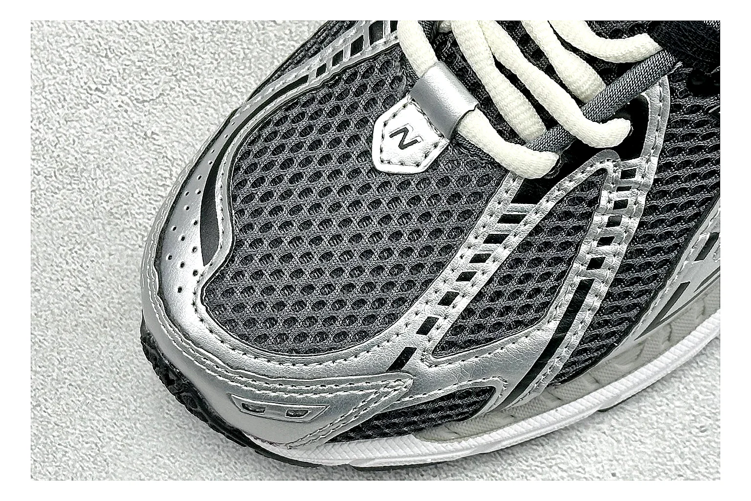 New Balance 1906 Black Silver comparison photo showing black mesh base, silver overlays, technical 1906 runner structure, and layered performance sole thumbnail 5