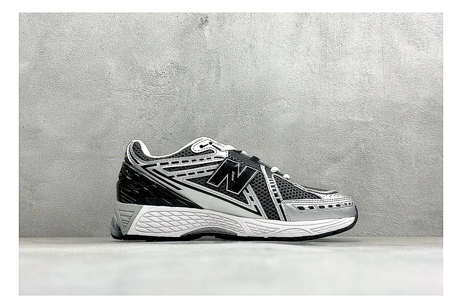 New Balance 1906 Black Silver comparison photo showing black mesh base, silver overlays, technical 1906 runner structure, and layered performance sole thumbnail 6