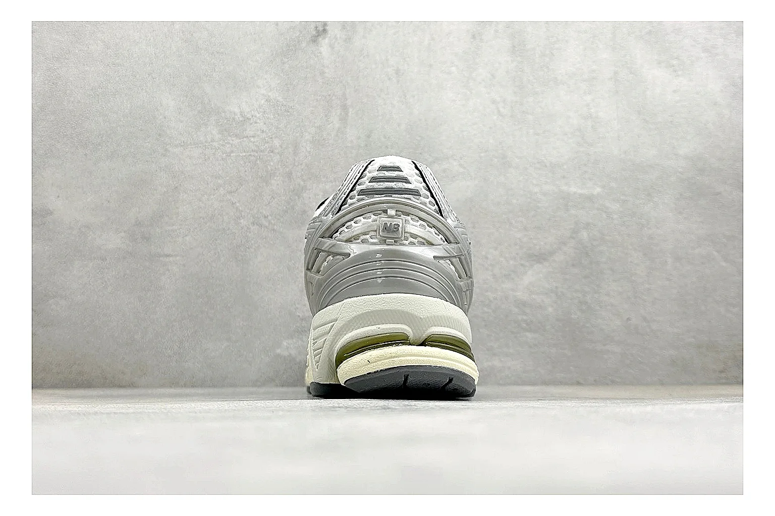 New Balance 1906 Silver Grey comparison image with silver overlays, grey mesh panels, technical runner structure, and layered midsole tooling thumbnail 3