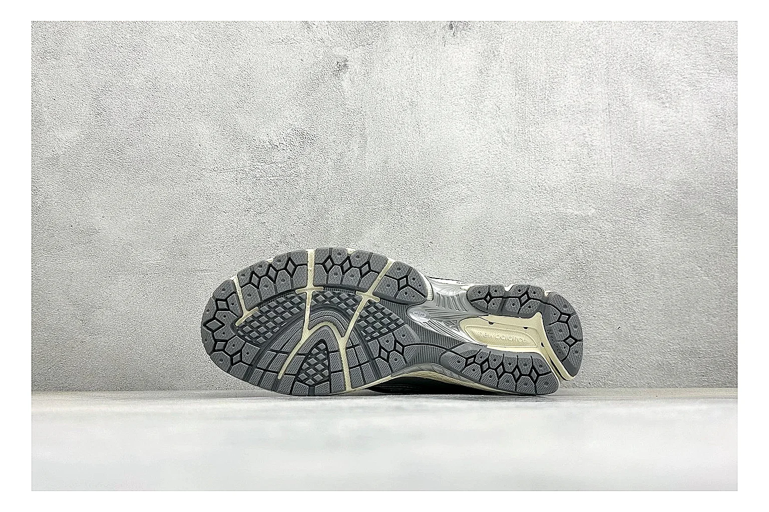 New Balance 1906 Silver Grey comparison image with silver overlays, grey mesh panels, technical runner structure, and layered midsole tooling thumbnail 4