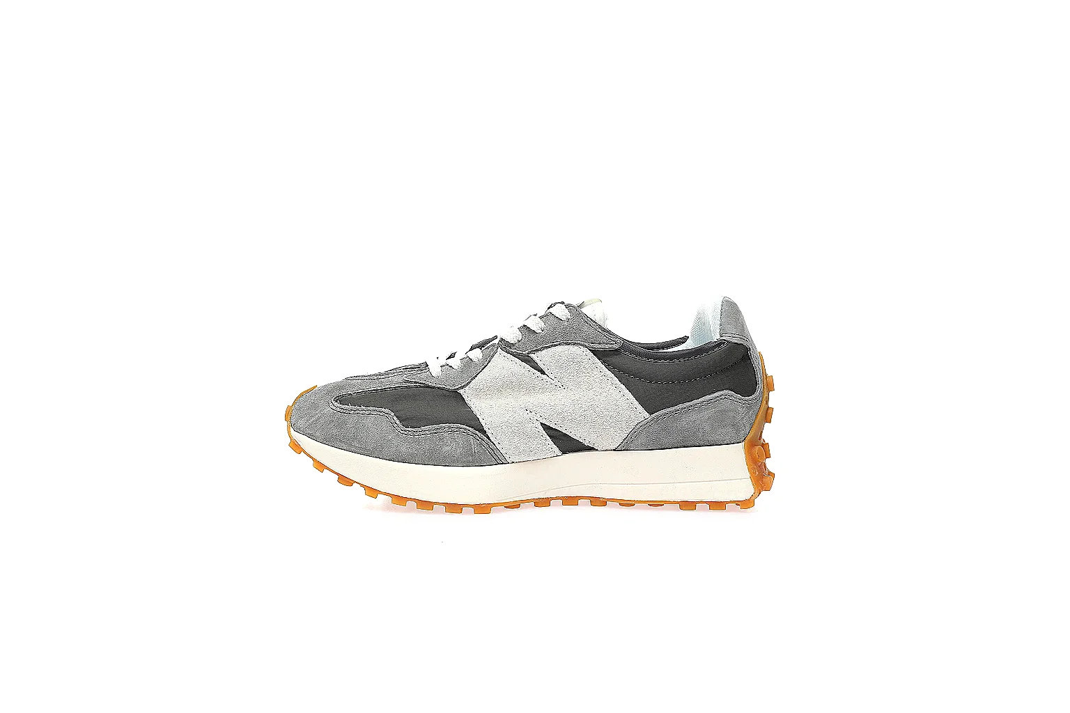 New Balance grey black runner gallery showing side logo, top view, heel branding, and gum outsole thumbnail 2