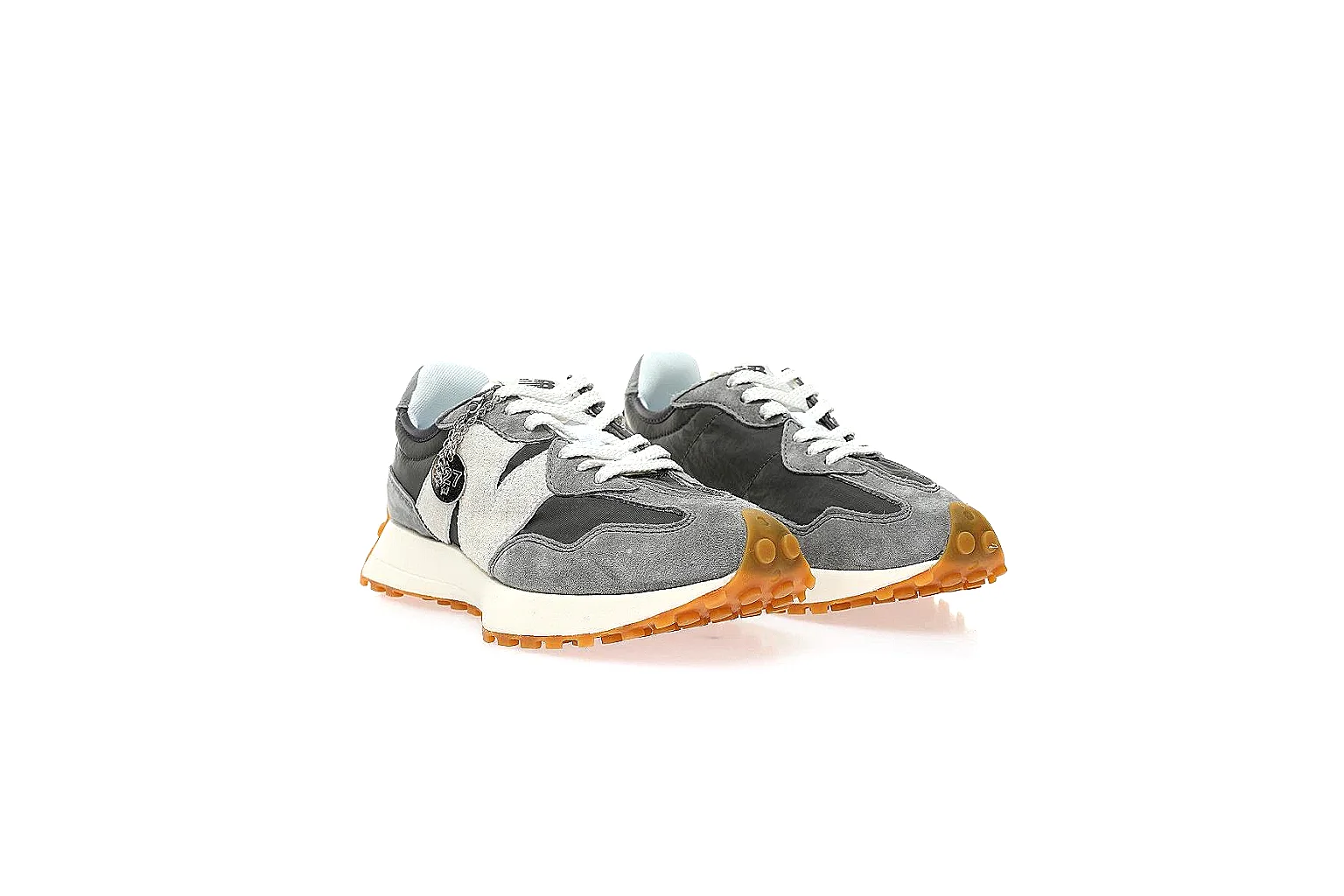 New Balance grey black runner gallery showing side logo, top view, heel branding, and gum outsole thumbnail 5