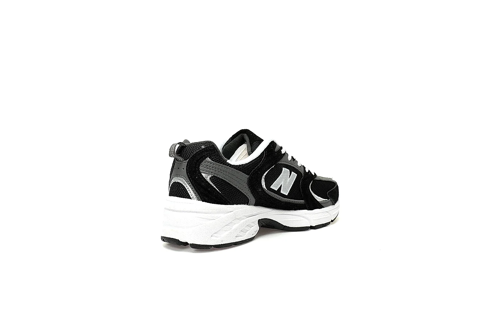 New Balance 530 black white six-angle gallery with outsole and pair view