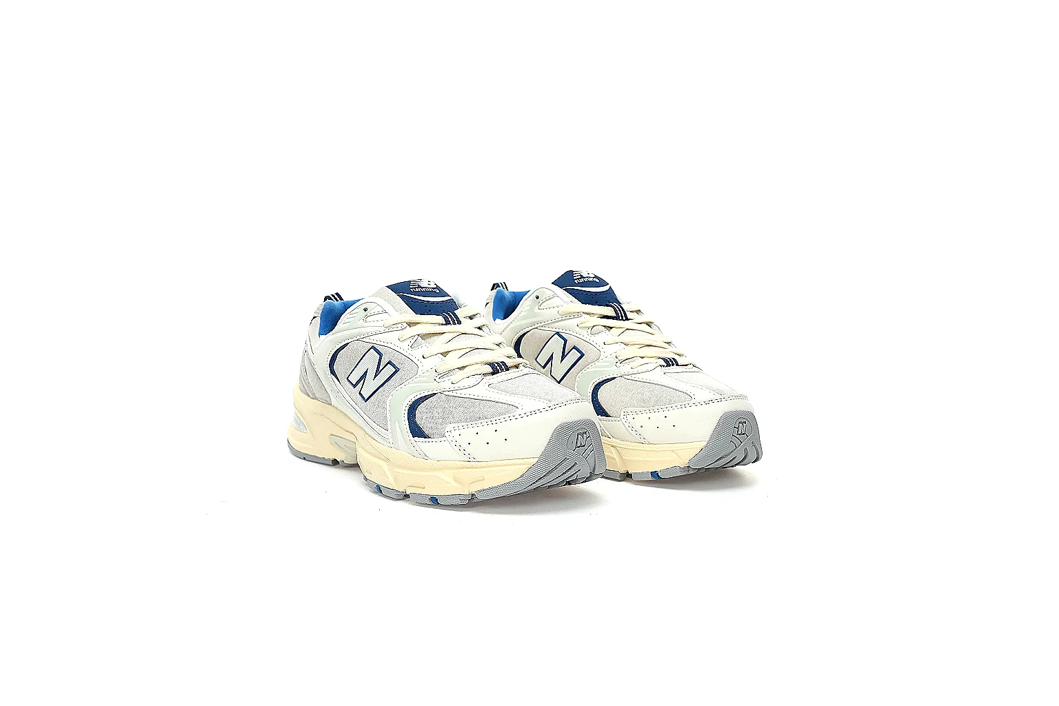 New Balance 530 cream blue pair with QC-visible side logo and outsole thumbnail 5