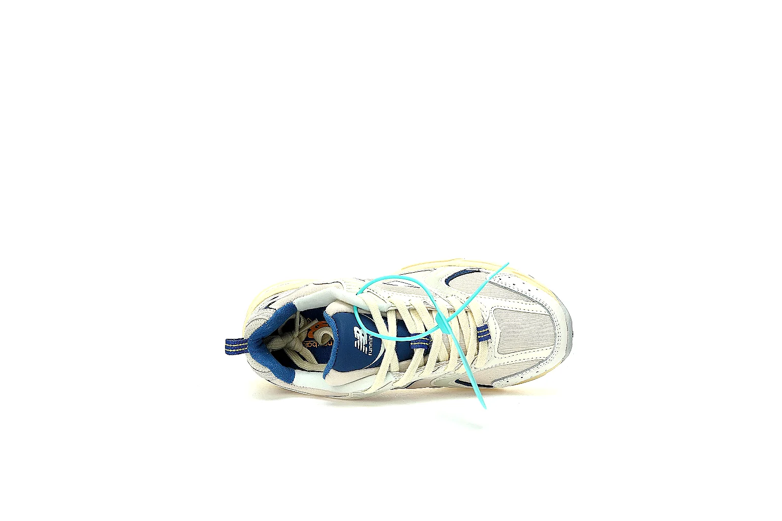 New Balance 530 cream navy side profile with navy N logo and ABZORB-style midsole thumbnail 3